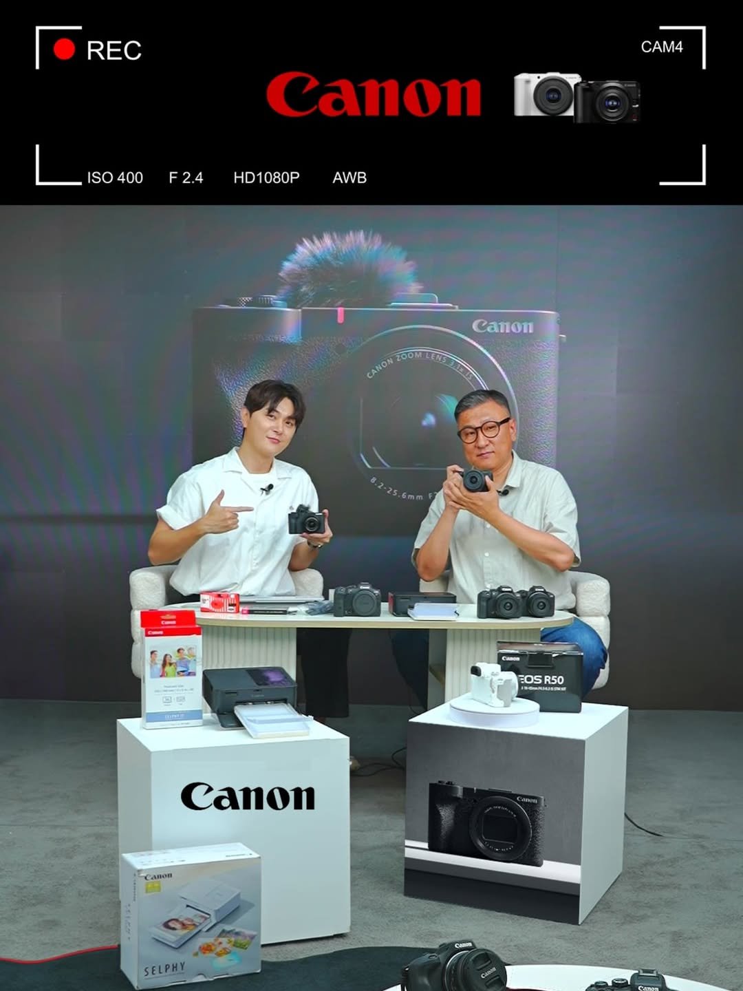 Photo by 방송인 이종우 ᴊᴏɴɢ ᴡᴏᴏ on July 25, 2025. May be an image of 2 people, printer, camera, camcorder, tripod and text that says 'REC CAM4 ISO ISO400 400 F2.4 Canon HD1080P AWB Canon CANON 10 OOMEEN 드만니다 CaNm EOS R50 R50 OA NANNG SN Canon Canun 20 SELPHY'.