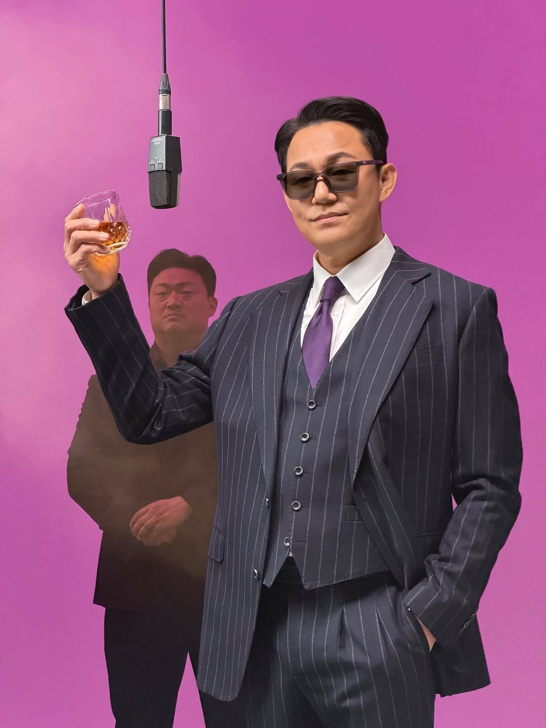 Photo by 박성웅 on January 21, 2026. May be an image of suit, blazer, dinner jacket, poster and text.