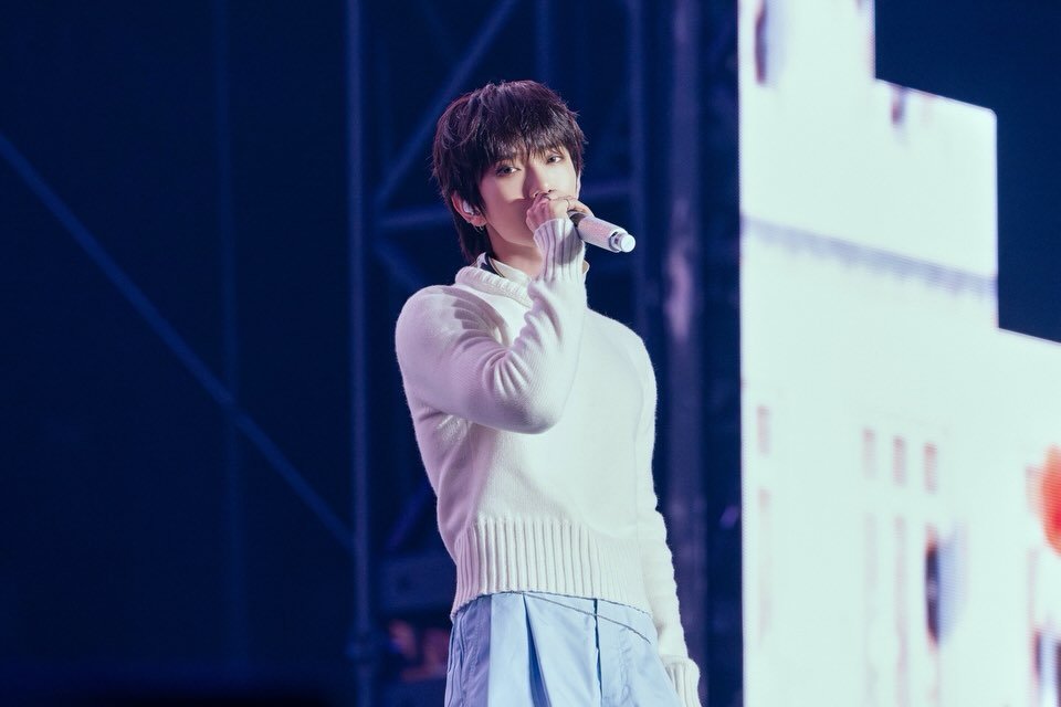 Photo by Joshua Hong on December 23, 2025. May be an image of one or more people, bangs, concert and text that says '11E'.