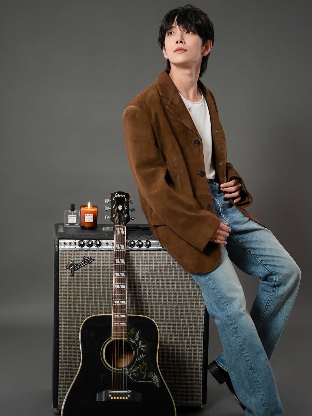 Photo shared by LOLA JAMES HARPER on December 10, 2025 tagging @joshu_acoustic. May be an image of guitar, duffle coat, amplifier and text.