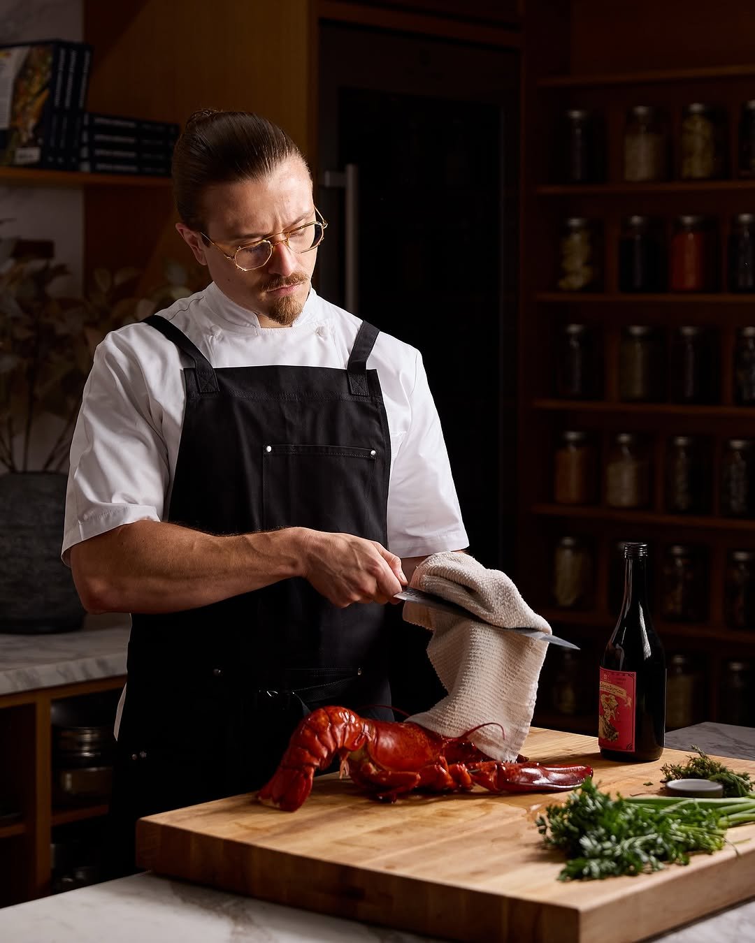 Photo by Joshua Weissman on October 10, 2025. May be an image of lobster, apron and text.
