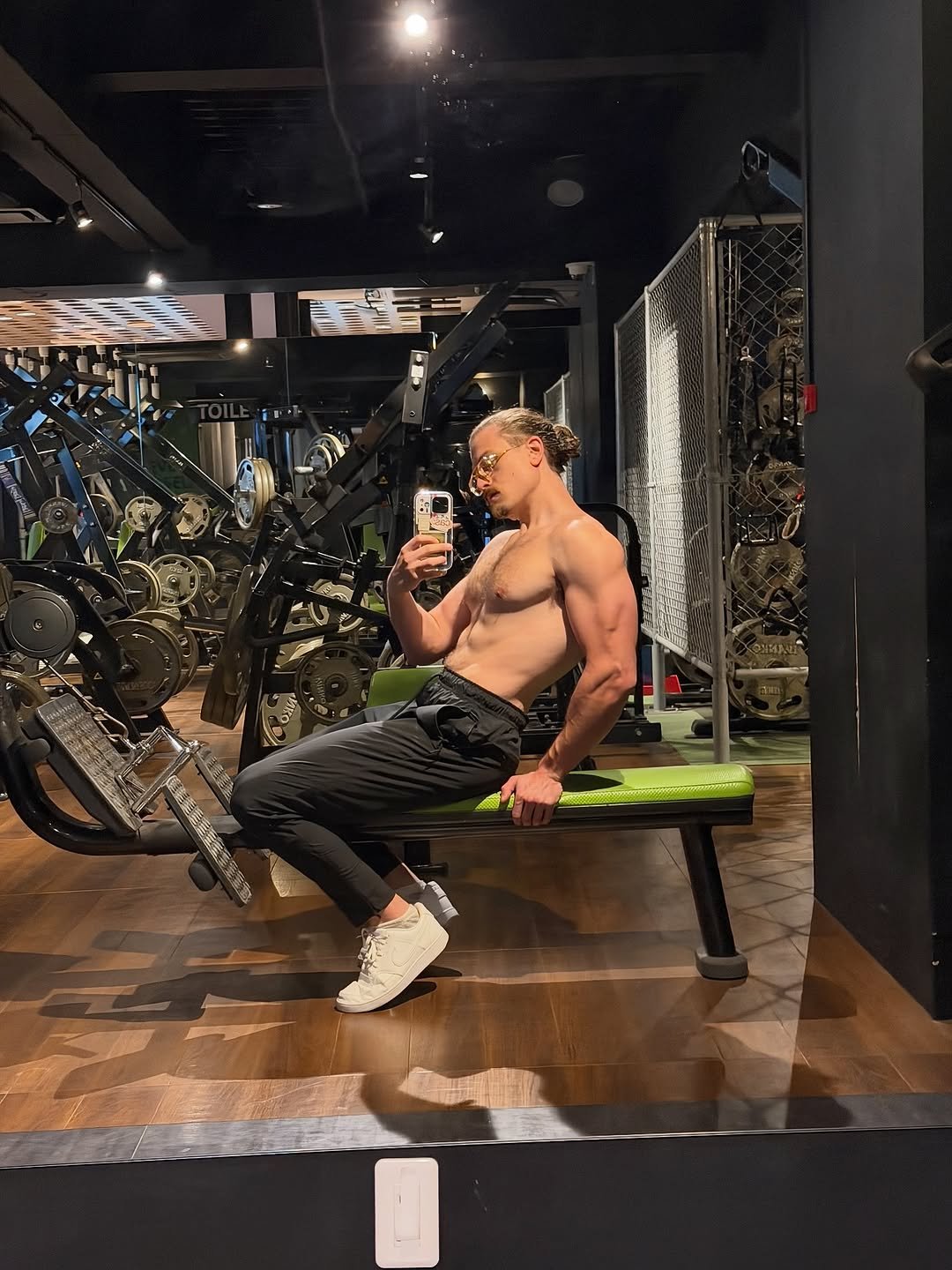 Photo by Joshua Weissman on November 10, 2025. May be an image of one or more people, biceps, people bodybuilding, activewear, punching bag, sweatpants and text.