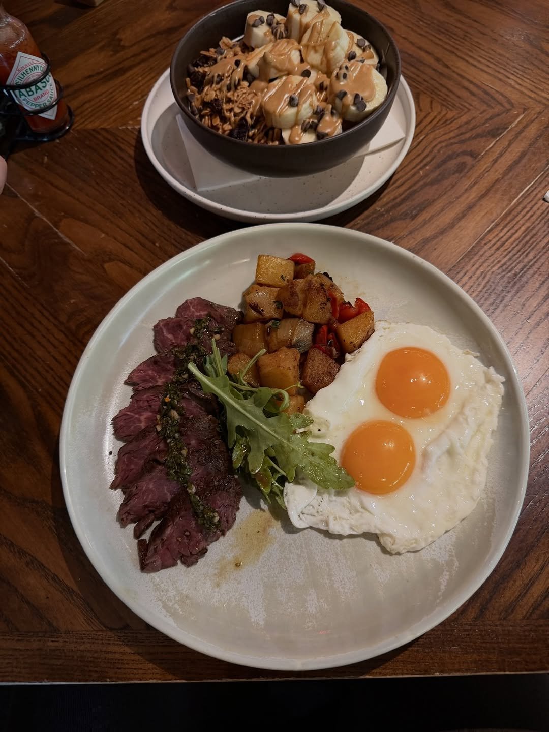 Photo by Joss Way-Ar Sangngern. on April 01, 2026. May be an image of poached egg, egg yolk, steak and text.