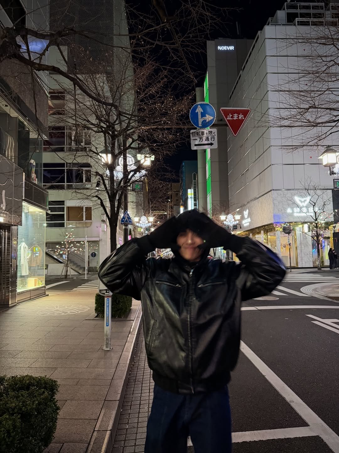 Photo by Joss Way-Ar Sangngern. on January 15, 2026. May be an image of duffle coat, parka, street, Tokyo Tower, night and text.