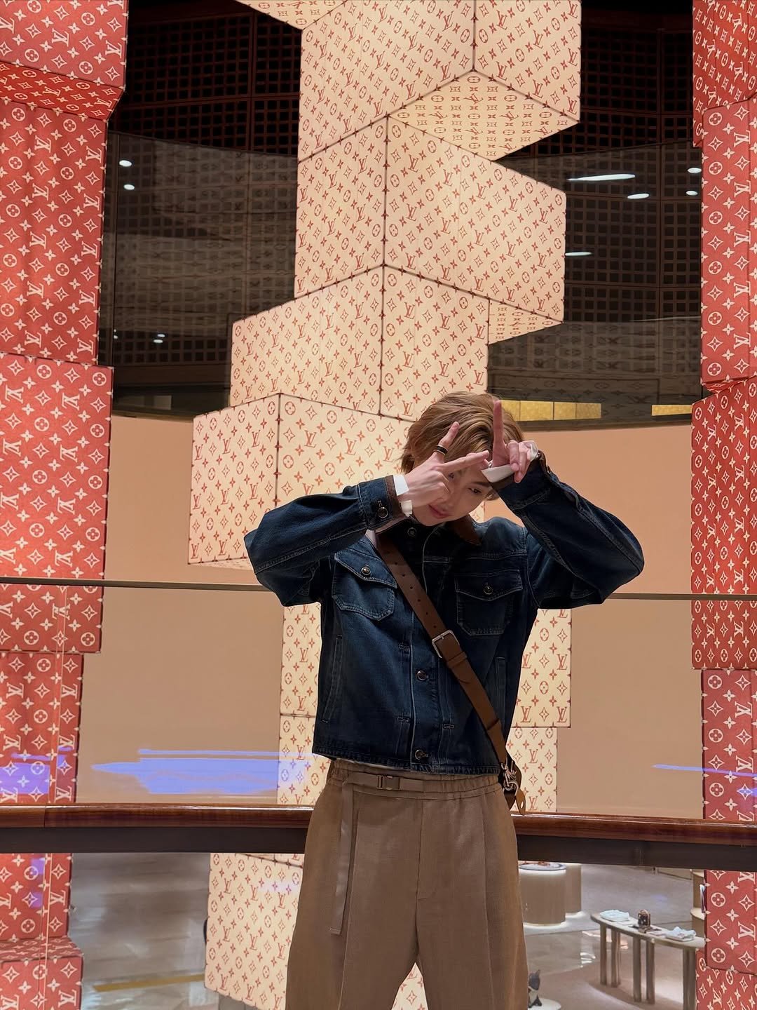 Photo by WOOCHAN • 우찬 on March 13, 2026. May be an image of duffle coat, overcoat and text.