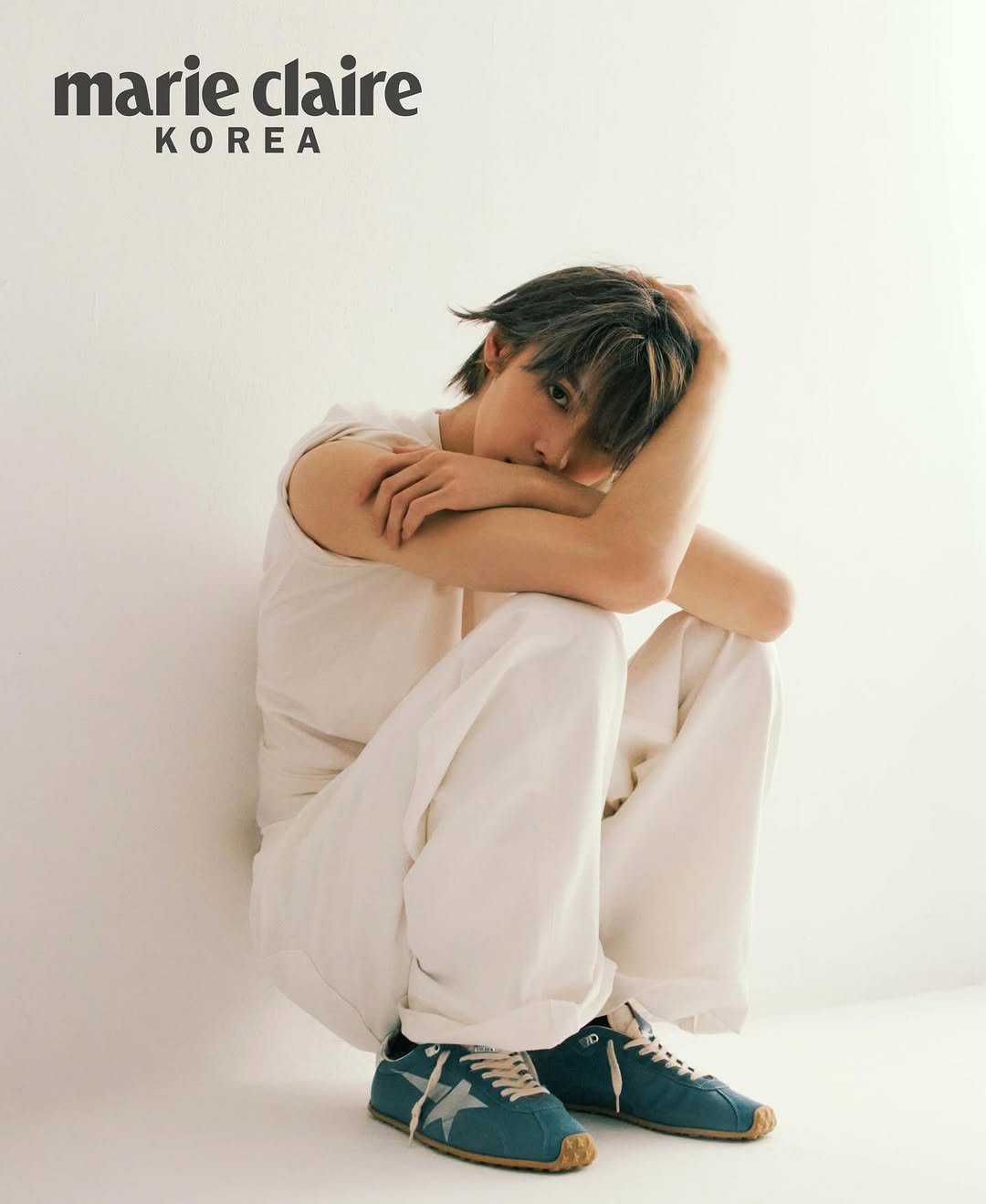 Photo by WOOCHAN • 우찬 on February 22, 2026. May be an image of one or more people, bangs, shoes, top and text that says 'marie marieclaire claire'.