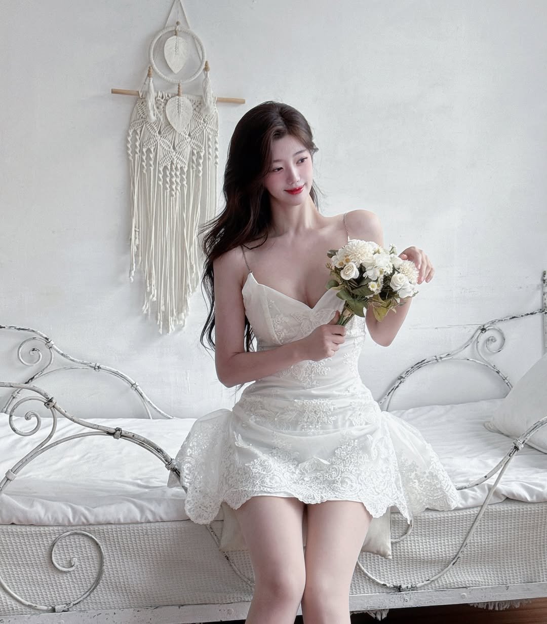 Photo by 강지은 on December 12, 2025. May be an image of macrame, chemise, dress, wedding and text.