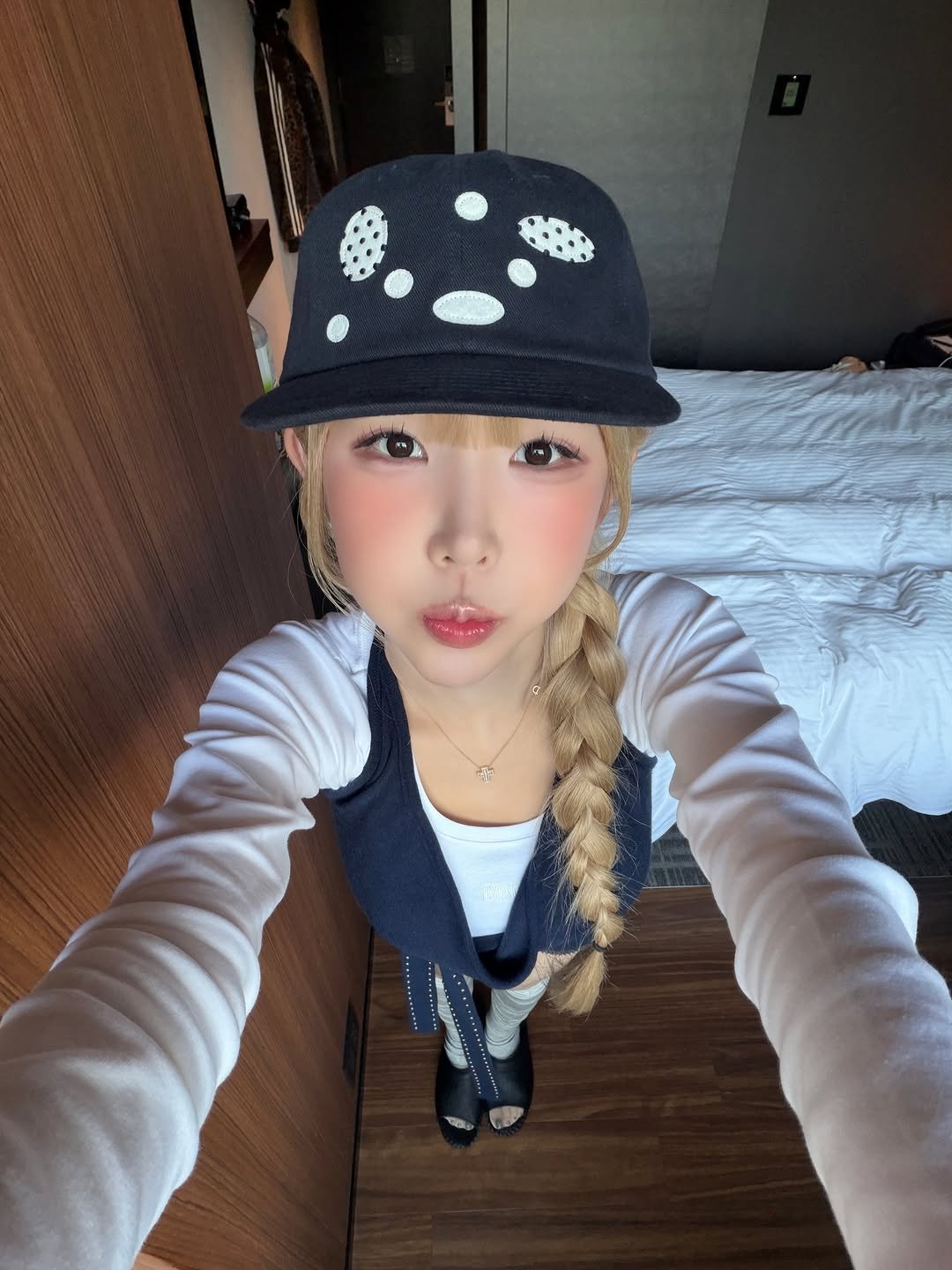 Photo by 조이서 Joyseo on April 11, 2026. May be a selfie of hat and text.