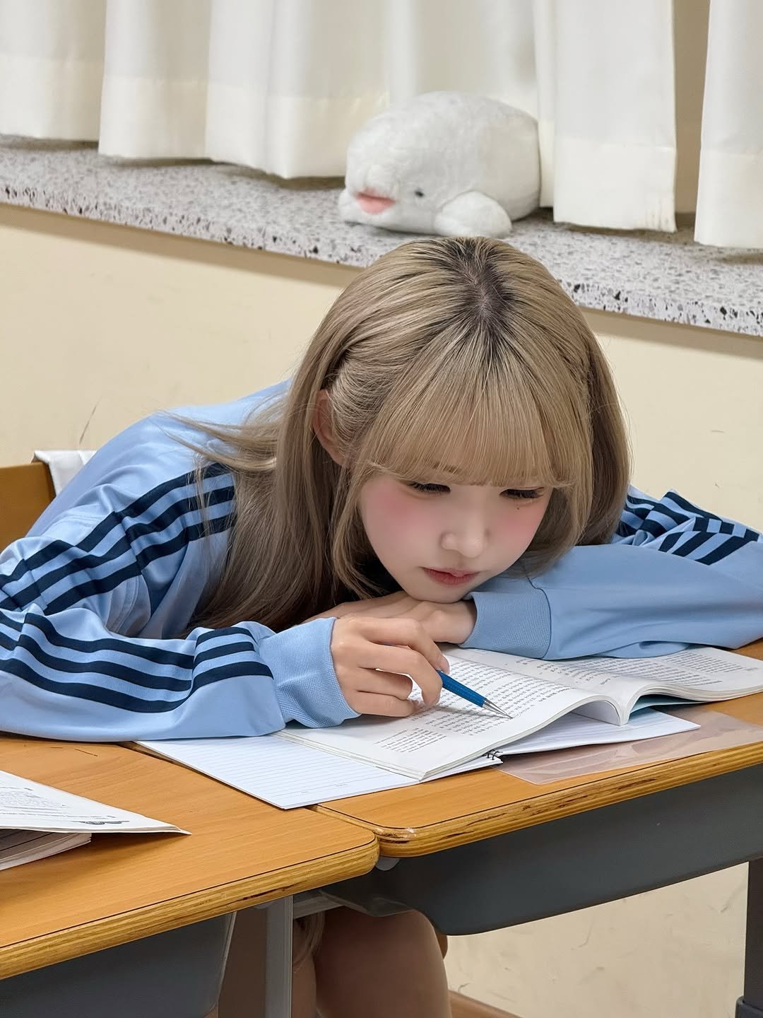 Photo by 조이서 Joyseo on June 28, 2025. May be an image of 1 person, hair, studying and text.
