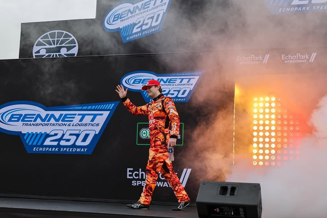 Photo shared by Carson Kvapil on February 23, 2026 tagging @jrmotorsports. May be a video game screenshot of racing vehicles and text that says 'BENNE BENNELD V&LOGISTICS 250 ENIPARDESECOMAY SPEEDWAY ao TRANSPORTA ECHOPARK ECHOPARK SPE EchaPark EchoPark SPEEDWAY BEANETT CATIONELOGISTICS TATION& ONGLOGISTICS NETT 350 EDWAY BENNETT TRANSPORTATION& TRANSPORTATIONSLOGISTICS & LOGISTICS 11250 ECHOPARKSPEEDWAY ECHOPARK SPEEDWAY Ech SPENOWAY WAY SPE'.