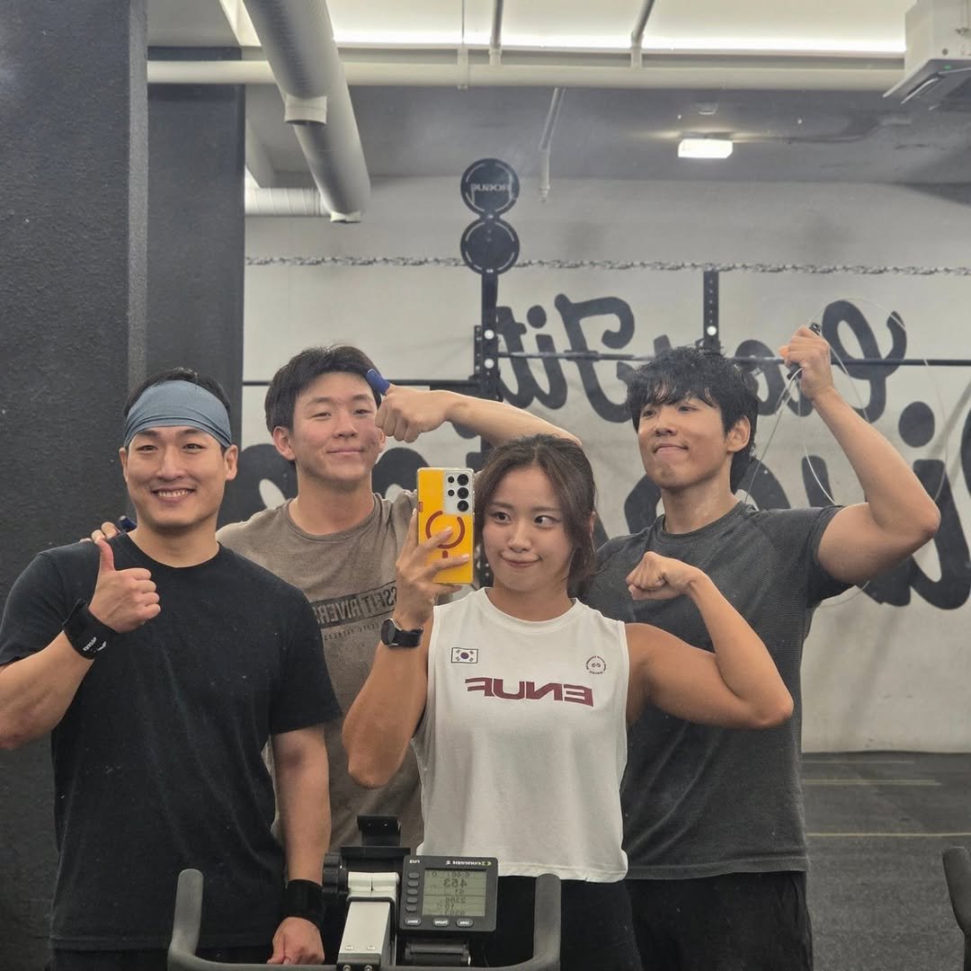 Photo shared by Judy 주디 on August 22, 2025 tagging @enuf.sports. May be an image of 3 people and text.