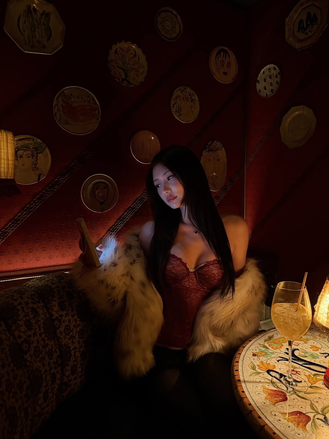 Photo by julia ma on April 03, 2026. May be an image of fur coat, fishnet stockings and text.