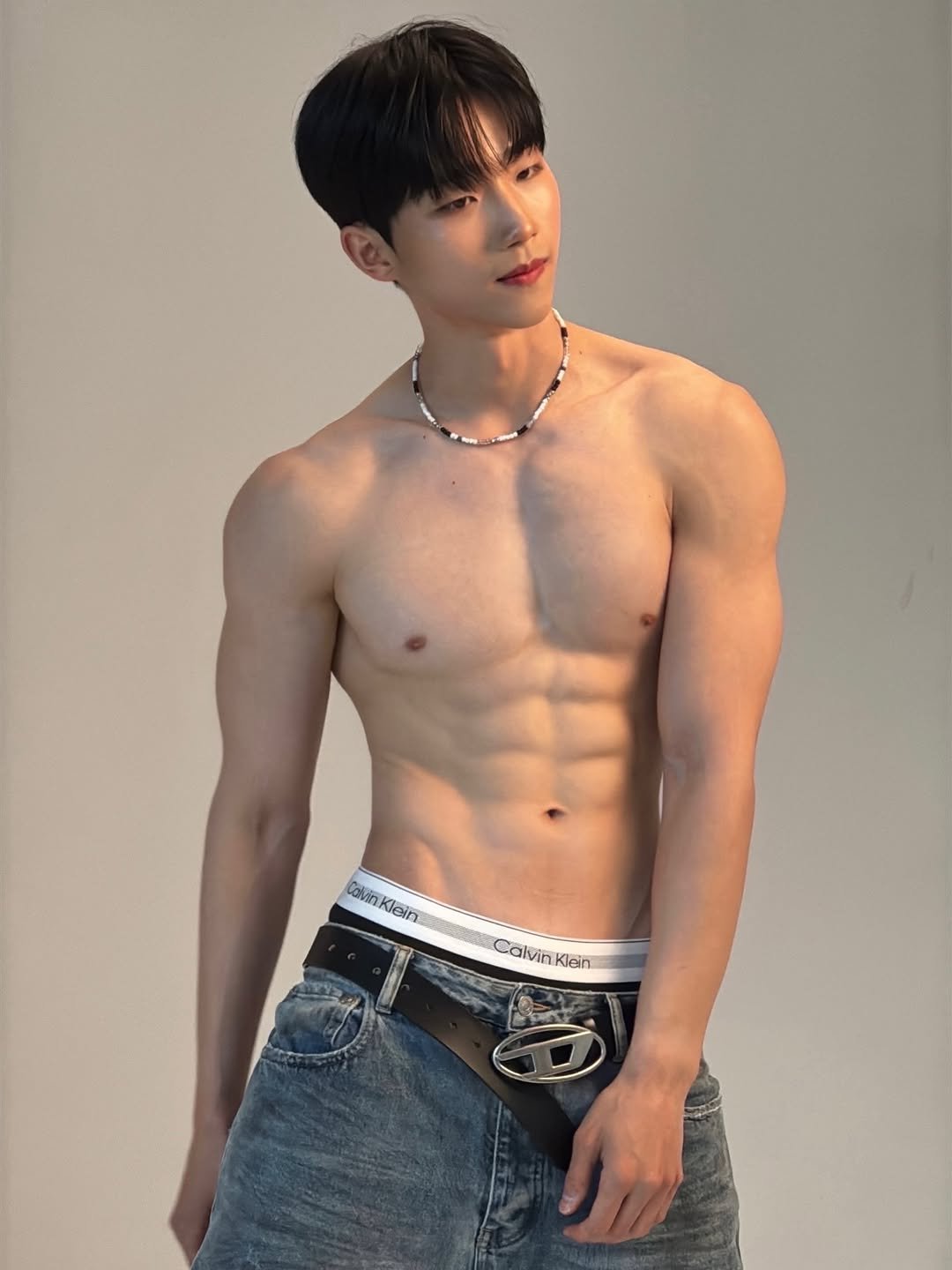 Photo by 경 원 on January 19, 2026. May be an image of one or more people, biceps, people bodybuilding, underwear and text.