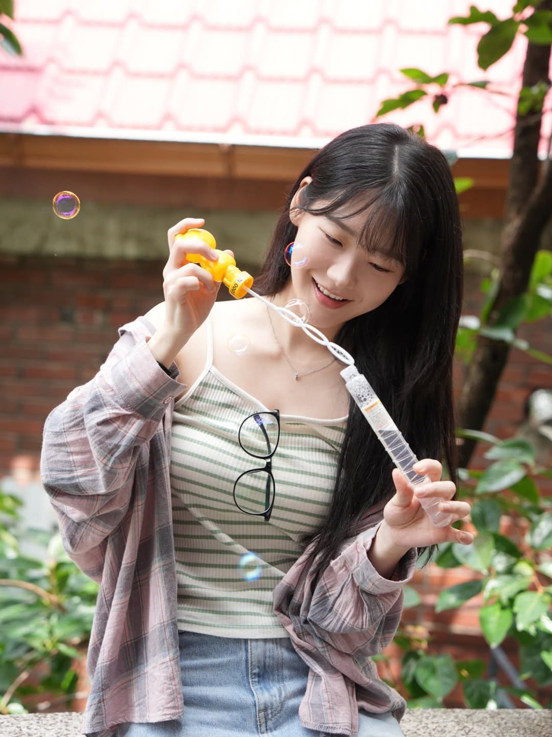 Photo by 조윤수 on September 03, 2025. May be an image of 1 person, chewing bubblegum, outdoors and text.