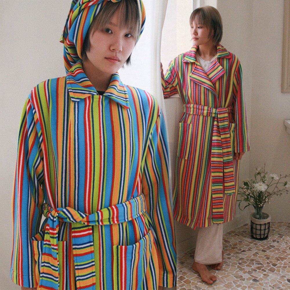 Photo by 준호 I 지속가능 패션 봉제공장 on December 26, 2025. May be an image of duffle coat, sleepwear, stripes, poncho, bath robe, robe and text.