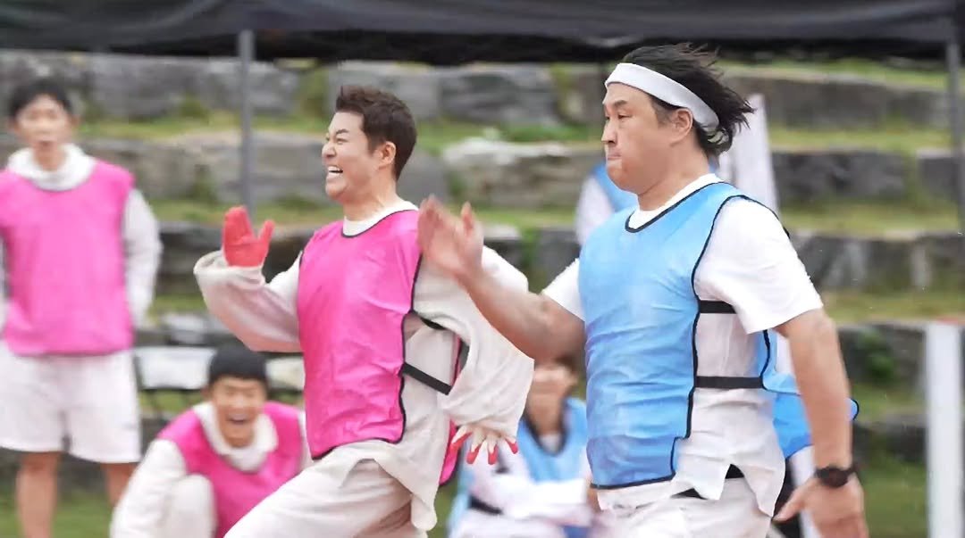 Photo shared by 전현무 on October 24, 2025 tagging @kusunghwan. May be an image of one or more people, bangs, people playing football, top, sports equipment, stadium and text.