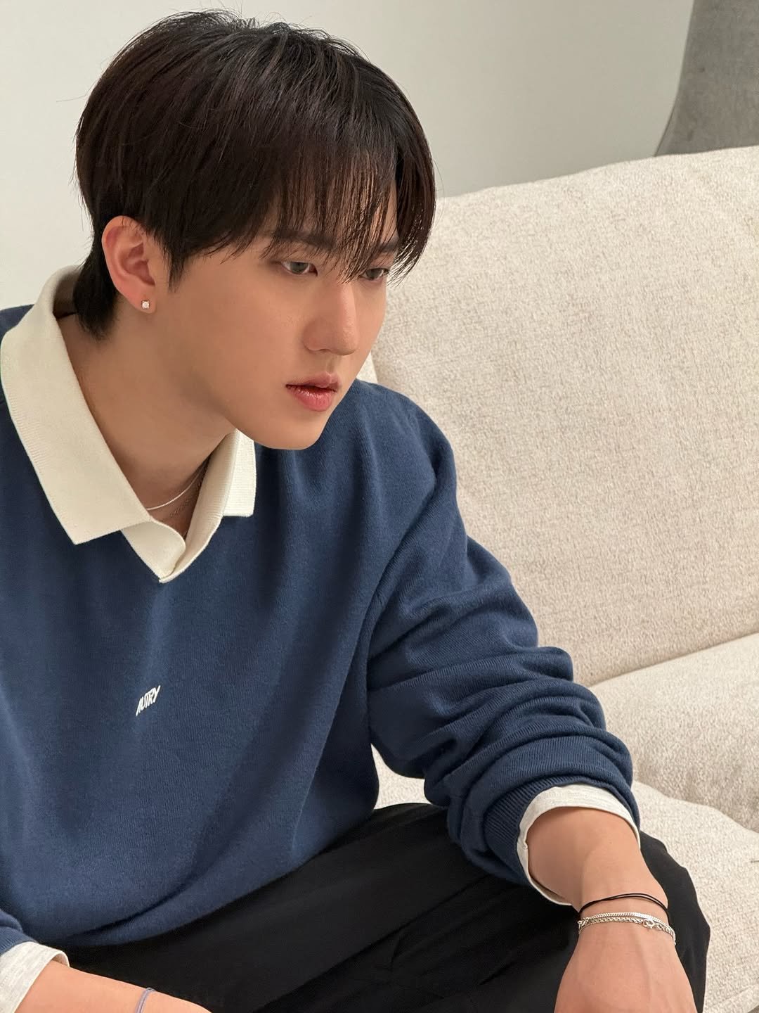 Photo shared by CHANGBIN on February 26, 2026 tagging @autryglobal. May be an image of bolo tie, top and text.