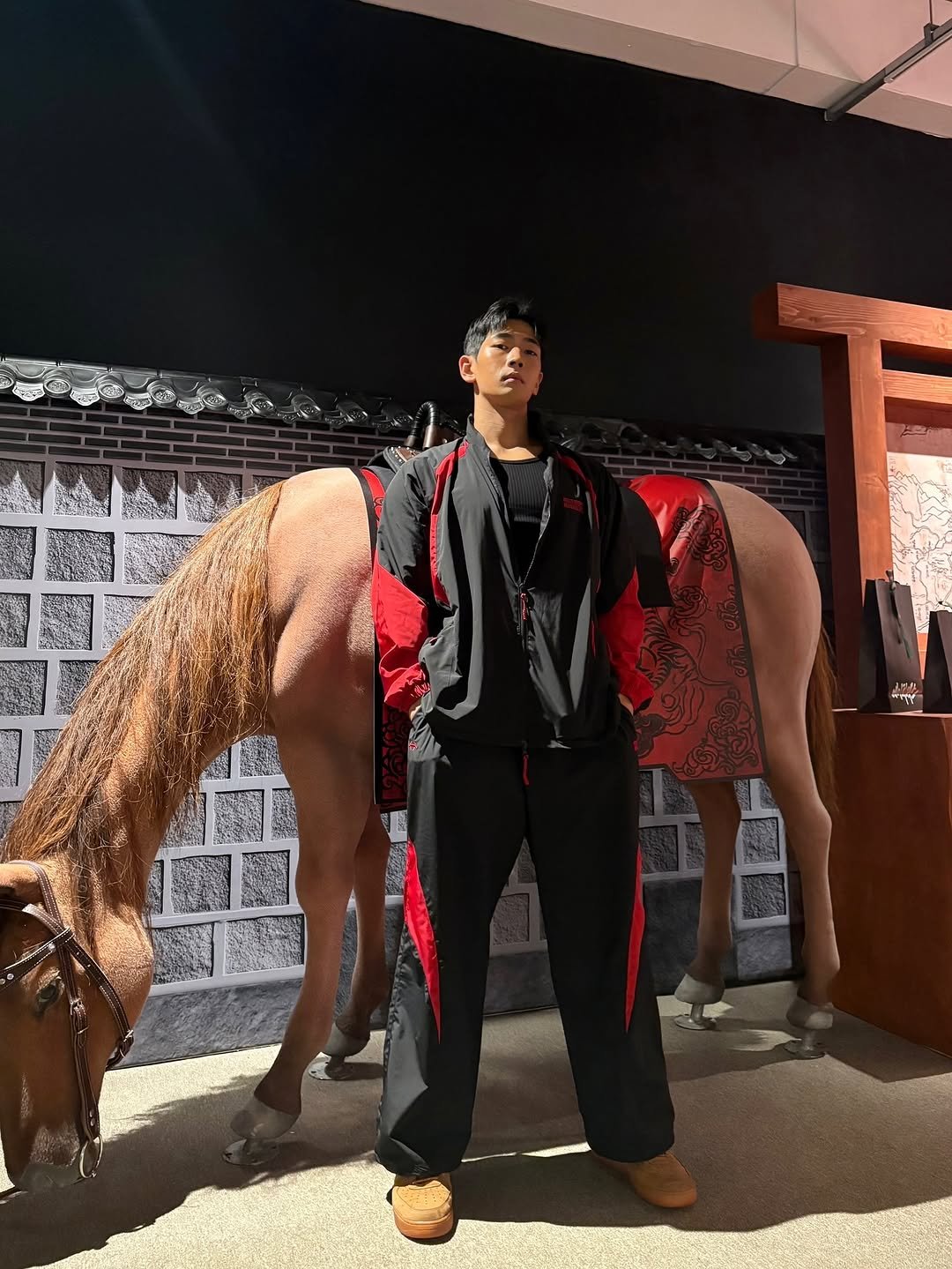 Photo shared by 이준한 on November 14, 2025 tagging @hdex__official. May be an image of camel, overcoat and text.