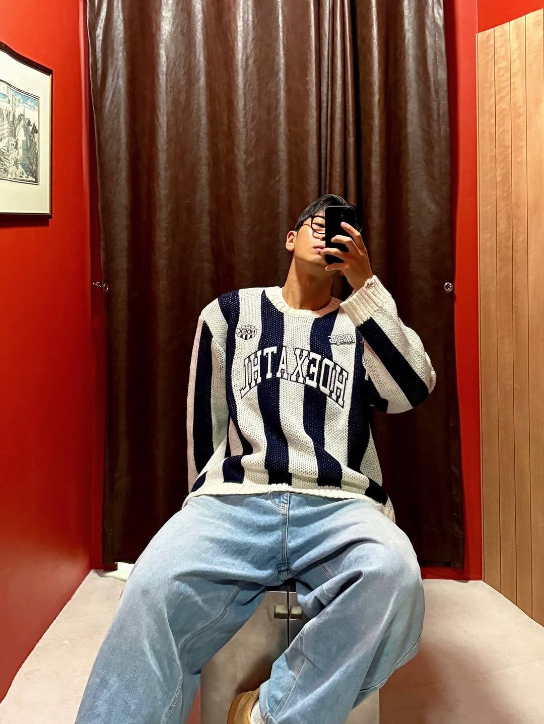 Photo shared by 이준한 on December 19, 2025 tagging @hdex__official. May be an image of one or more people, bangs, sweater, sweatpants, top and text.