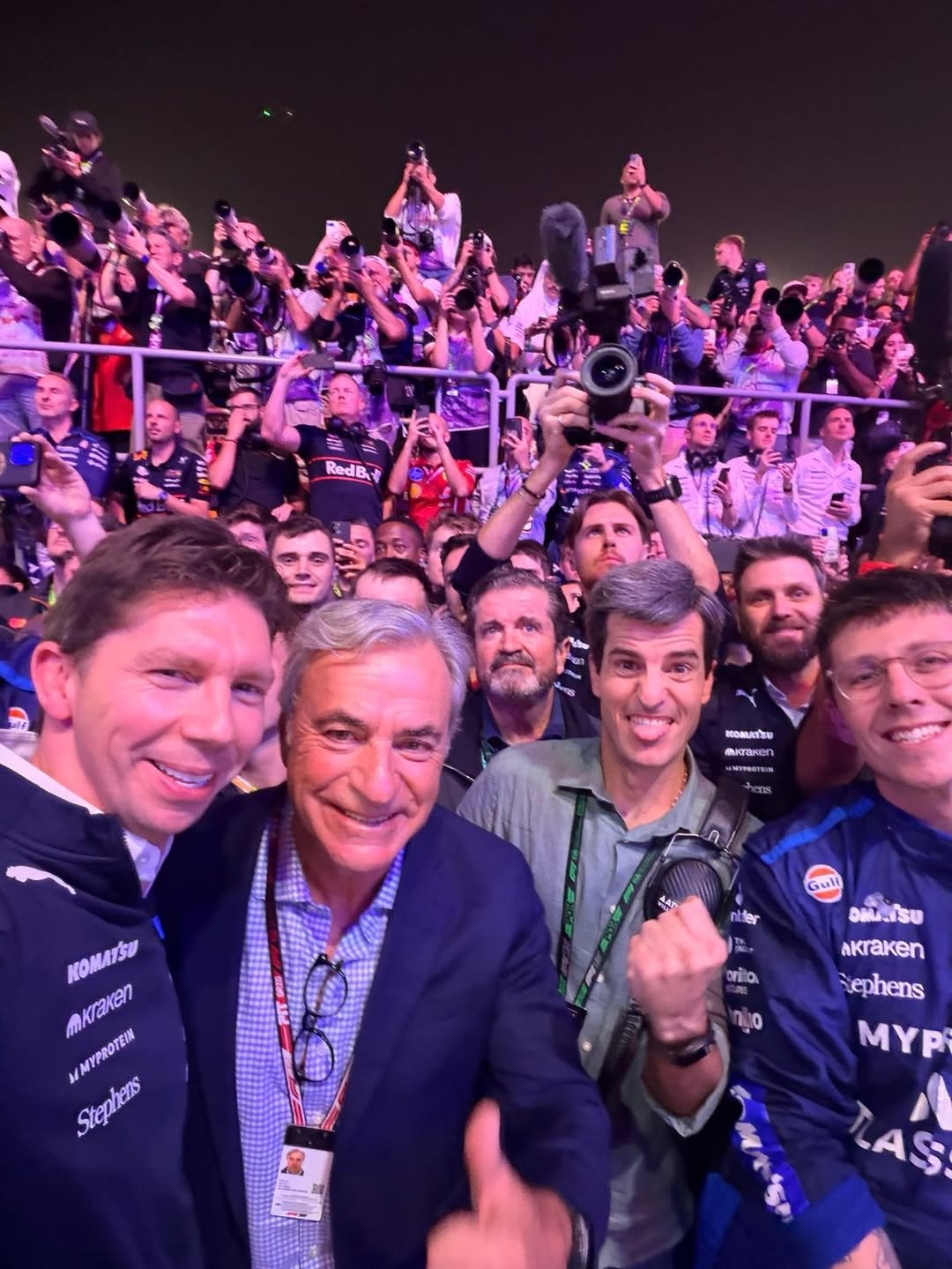 Photo by James Vowles in Lusail International Circuit with @carlossainzoficial. May be an image of one or more people, crowd, stadium and text.