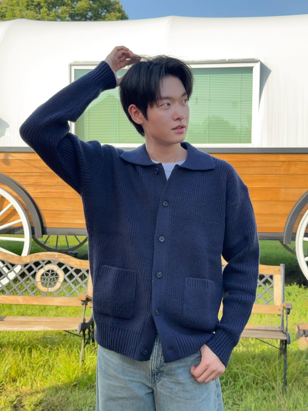 Photo shared by 백정훈 on September 29, 2025 tagging @blondnine_official, and @blon_d9. May be an image of 1 person, duffle coat, bolo tie and text.