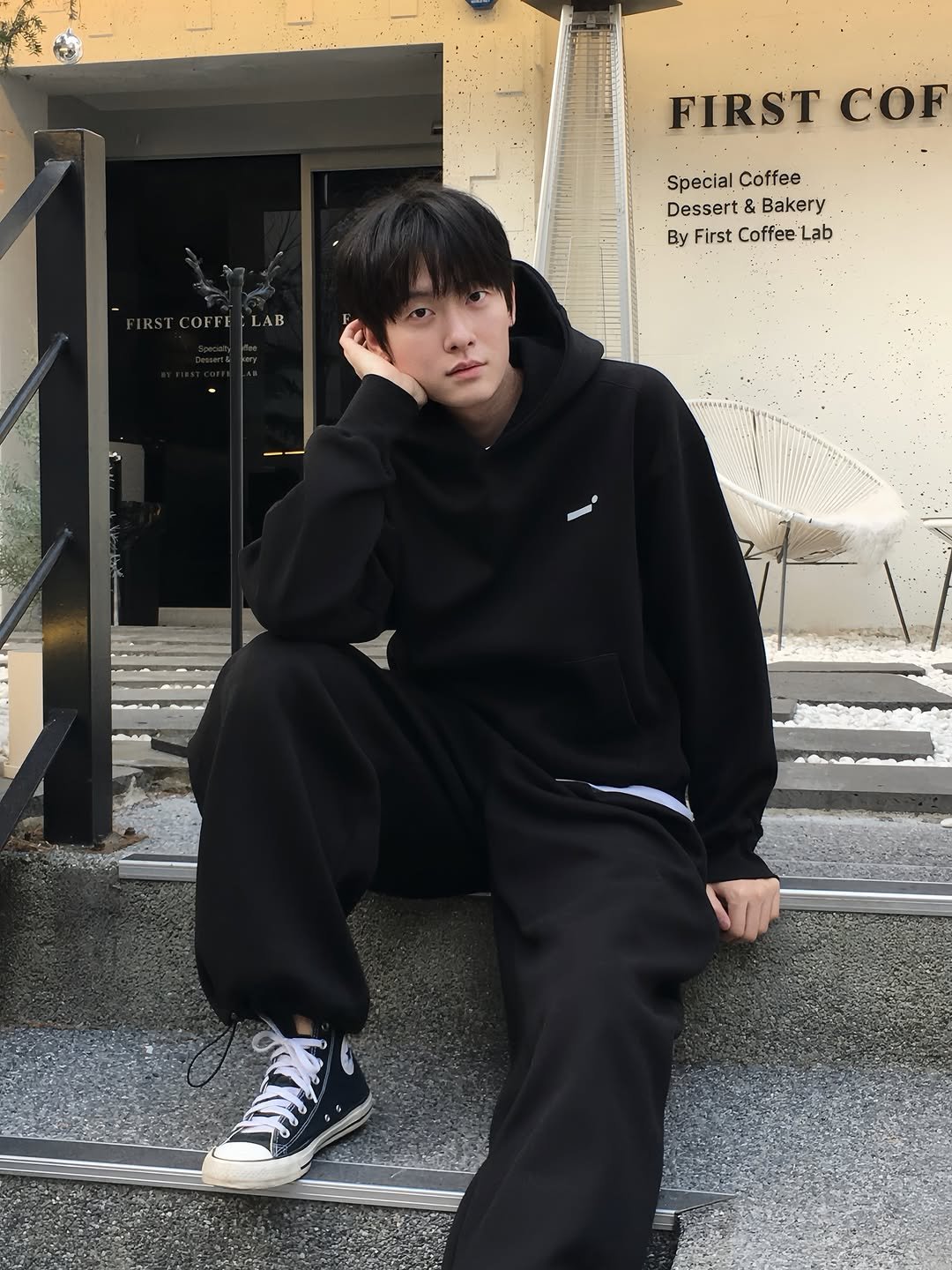 Photo shared by 백정훈 on March 25, 2026 tagging @under_.orb. May be an image of duffle coat, sweatpants and text that says 'FIRST COF Special SpecialCoffee Coffee Dessert& Dessert&Bakery Bakery. ByFirstCoffeeLab By First CoffeeLab Lab RSTCOFFE IRSTCOFFEFLAB LAB'.