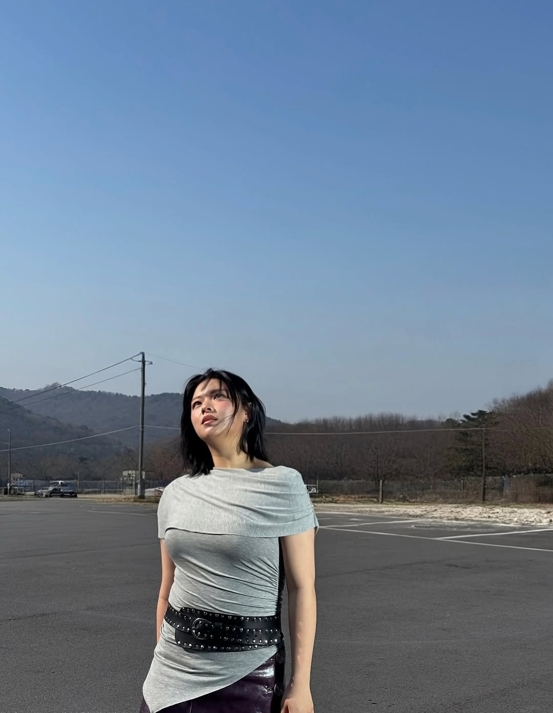 Photo by 정연 (JEONGYEON) on June 30, 2025. May be an image of 1 person, road and text.