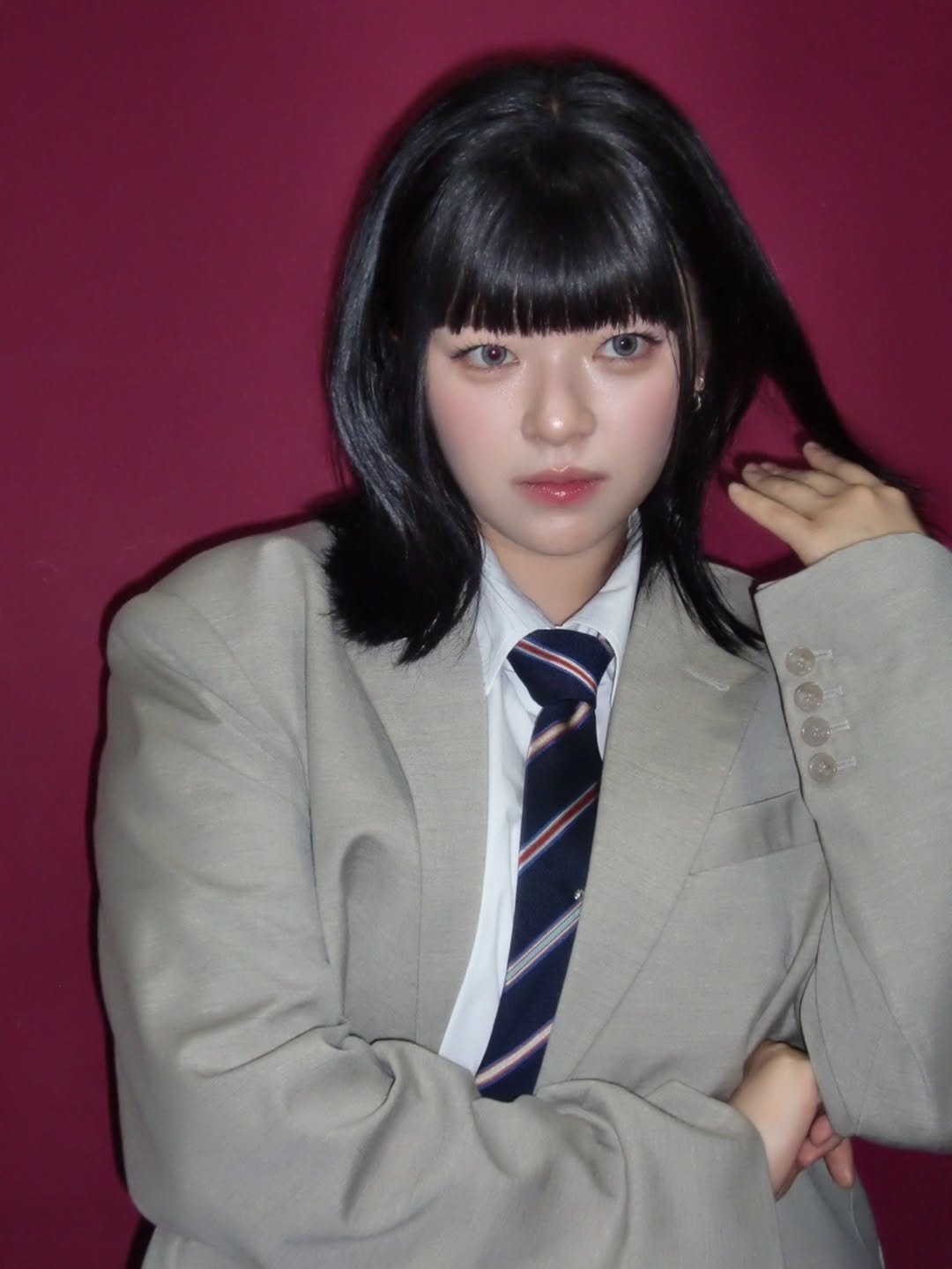 Photo by 정연 (JEONGYEON) on July 13, 2025. May be an image of 1 person, hair, duffle coat, suit, blazer and text.