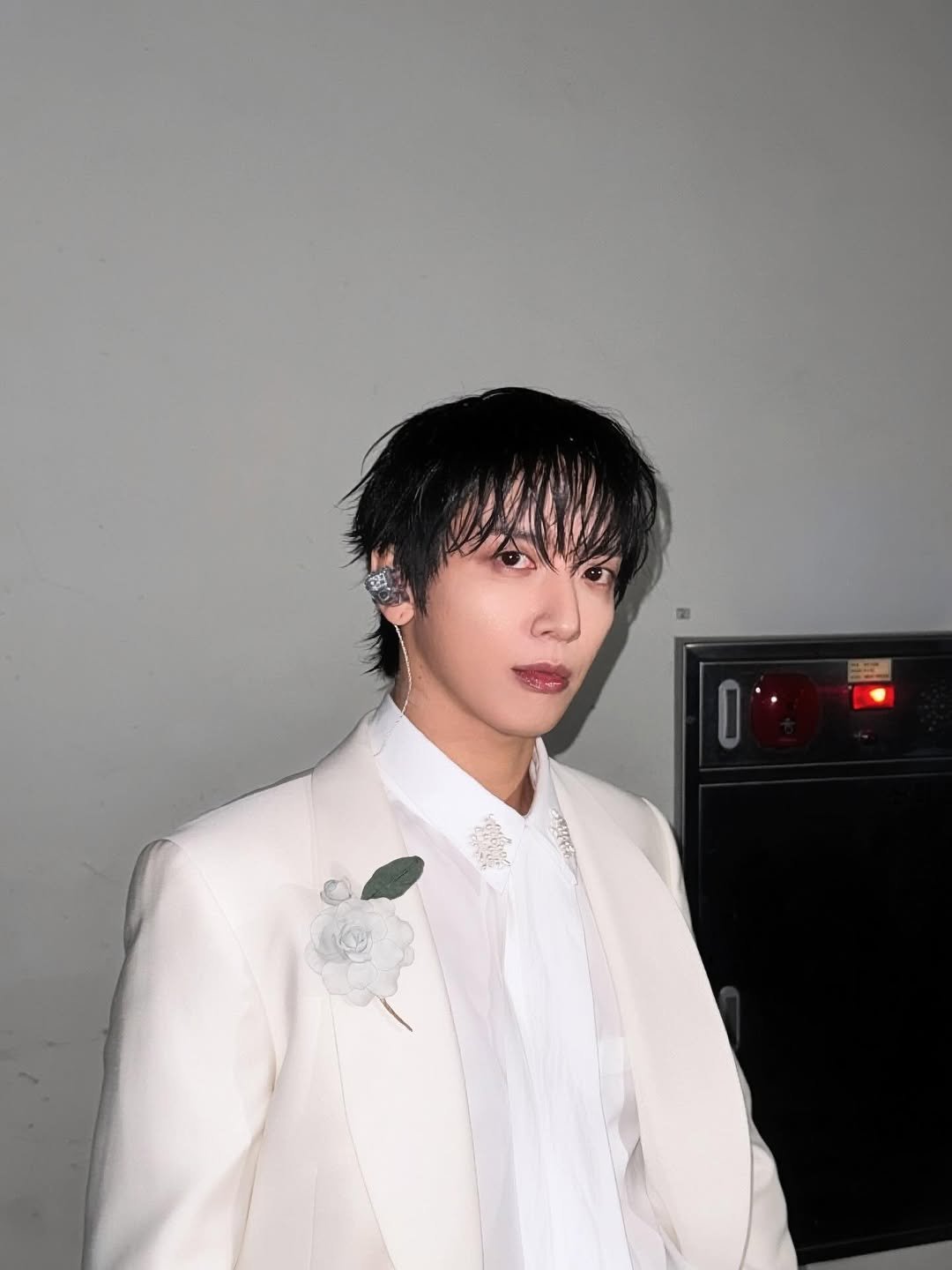 Photo by 정용화 on December 21, 2025. May be an image of one or more people, bangs, bolo tie and text.