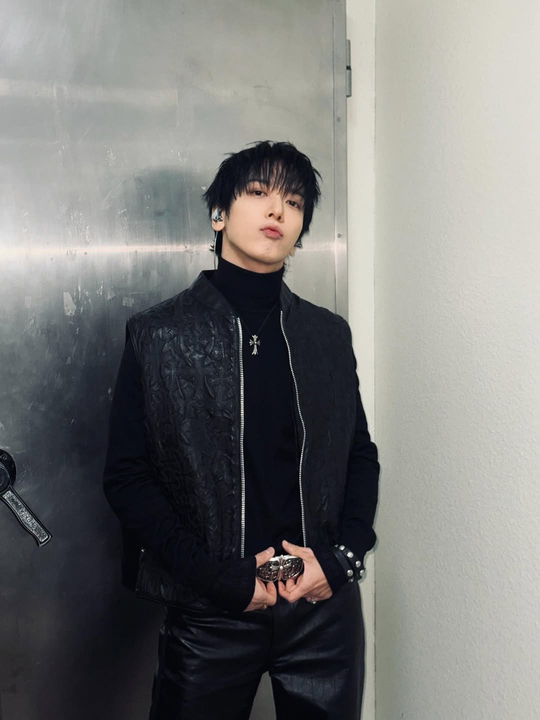 Photo by 정용화 on January 09, 2026. May be an image of one or more people, bangs, bolo tie, top, turtleneck and text.