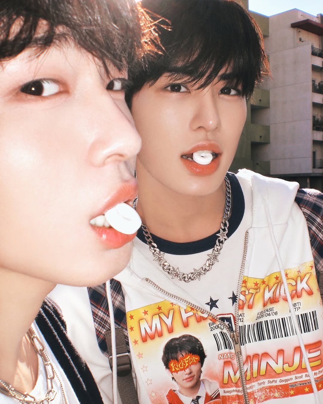 Photo shared by KickFlip on April 02, 2026 tagging @jypentertainment. May be an image of one or more people, bangs, bolo tie and text.