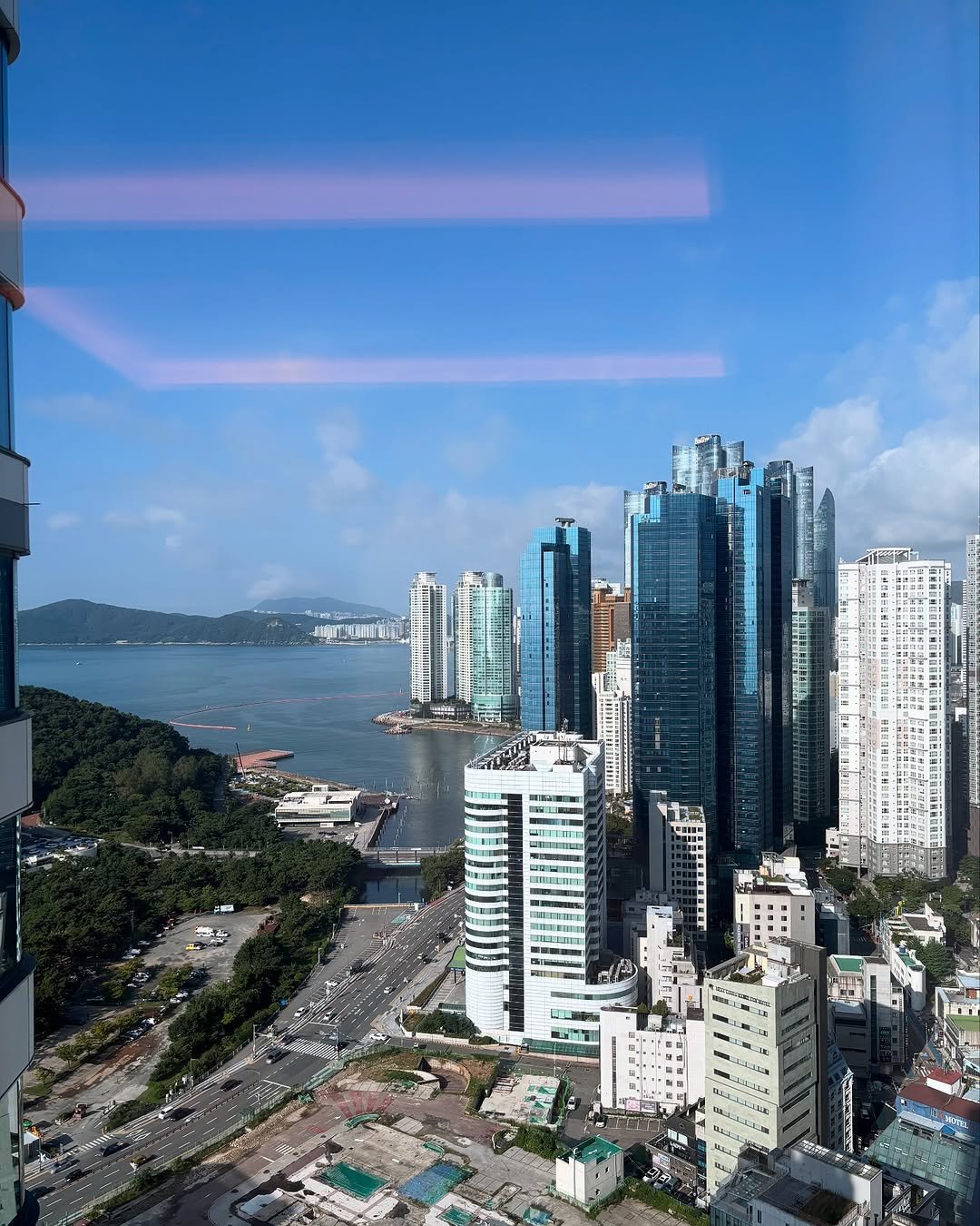 Photo by 은총 | 의진이네 🏡 on August 15, 2025. May be an image of skyscraper, the Panama Canal, Victoria Peak, buildings, tower and text.