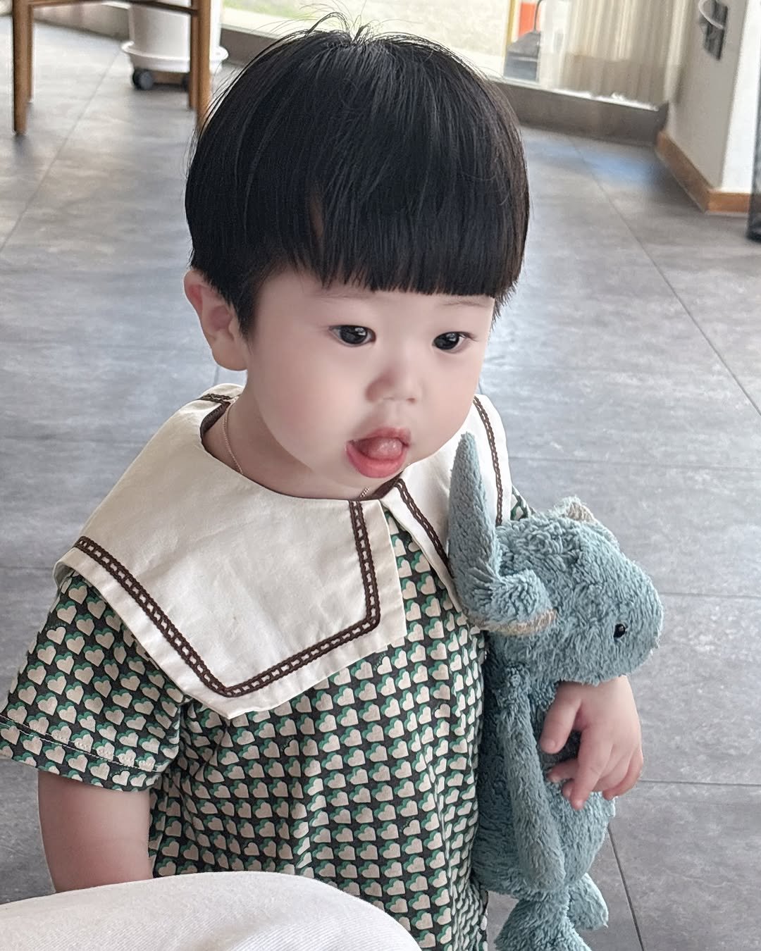 Photo by 은총 | 의진이네 🏡 on July 26, 2025. May be an image of 1 person, baby and text.