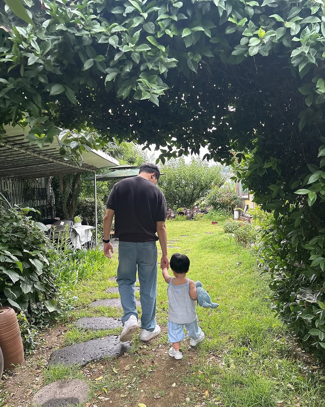 Photo by 은총 | 의진이네 🏡 on June 21, 2025. May be an image of 2 people, baby and text.