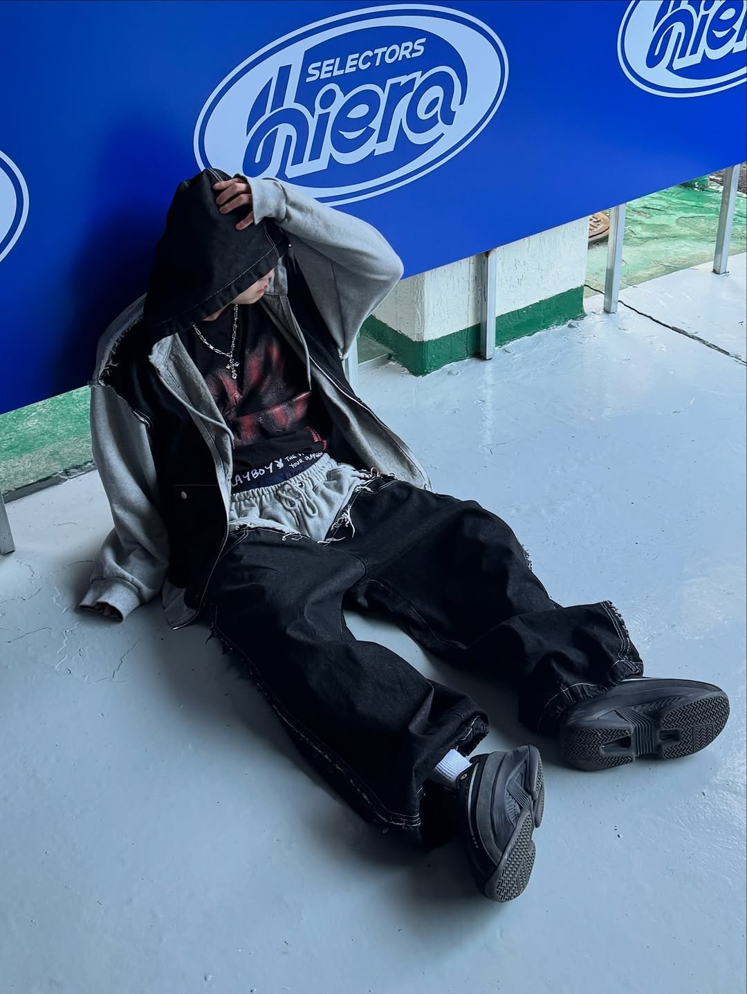 Photo shared by かぜ on March 03, 2026 tagging @ninenuts_official. May be an image of skateboard, face mask, parka, sweatpants and text.