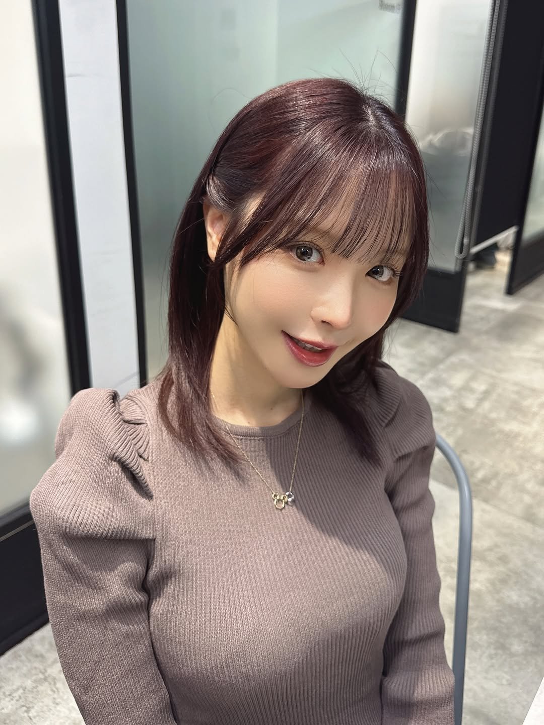 Photo by 桃乃木かな on February 16, 2026. May be an image of one or more people, braids, blonde hair, top, turtleneck and text.