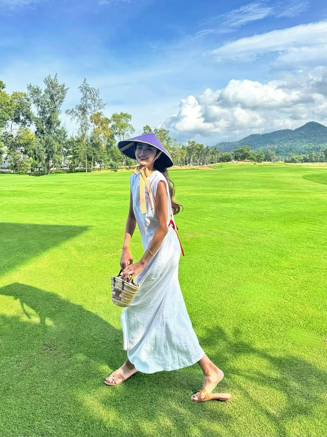 Photo shared by 강예진 on September 28, 2025 tagging @curlyshyll_official. May be an image of 1 person, sarong, outdoors and text.