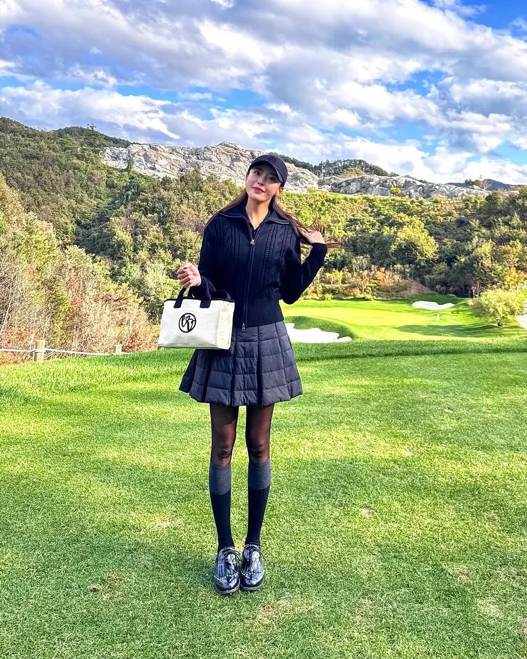 Photo shared by 강예진 on November 01, 2025 tagging @lordloar_official. May be an image of golf, miniskirt, kilt, golf course and text.