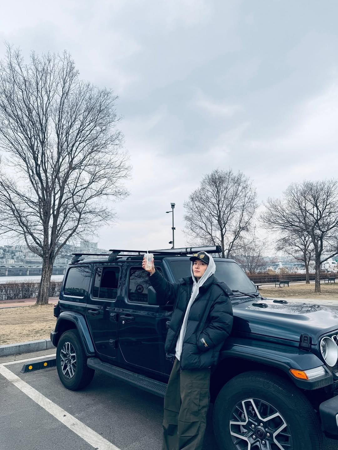 Photo shared by 강하늘 on March 05, 2026 tagging @jeepkorea. May be an image of car, jeep, limousine, windshield, road and text.