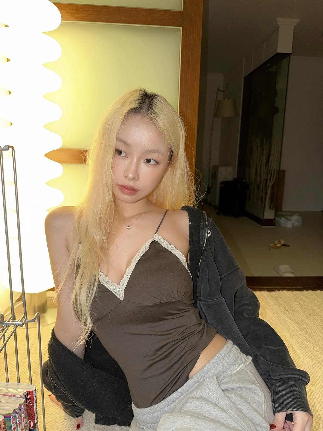 Photo by Kanna︎︎ on January 27, 2026. May be an image of one or more people, hair, sleepwear, sweatpants, turtleneck, top and text.