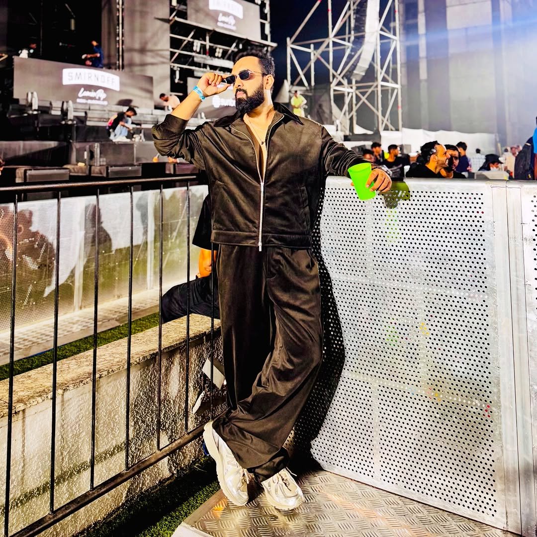 Photo shared by Kasim Dhamaskar on November 28, 2025 tagging @afrojack. May be an image of one or more people, beard, crowd, concert and text.