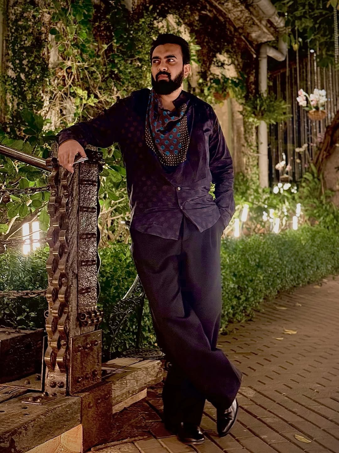 Photo by Kasim Dhamaskar on February 17, 2026. May be an image of one or more people, beard, suit, dinner jacket, bolo tie and text.