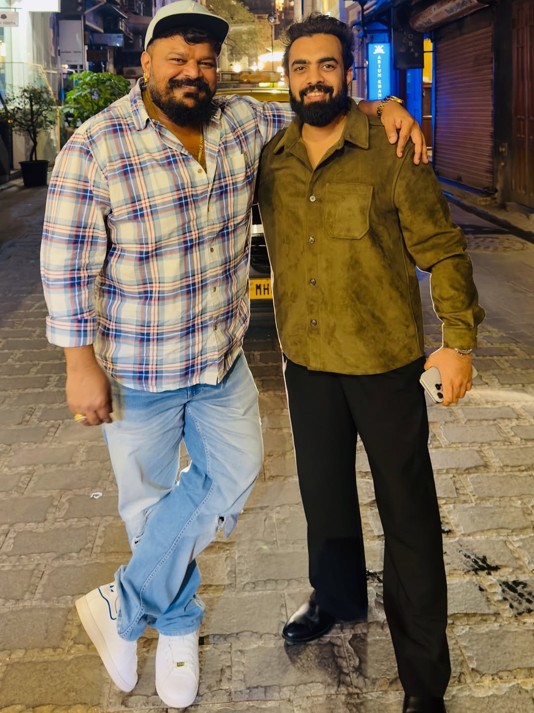 Photo shared by Kasim Dhamaskar on February 24, 2026 tagging @prembhagat88. May be an image of one or more people, beard, people standing and text that says 'H'.