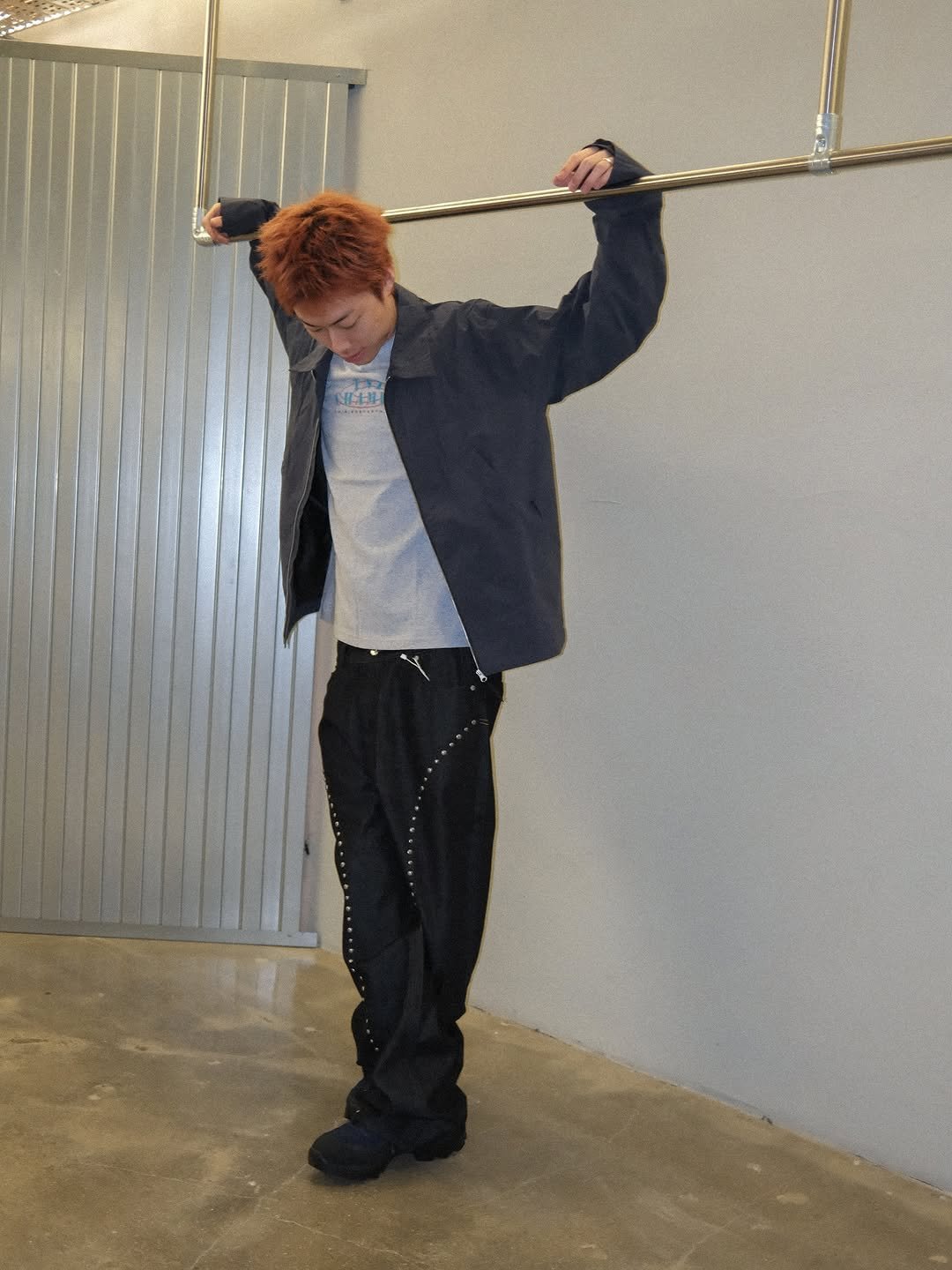 Photo by Kasina_Hannam on October 16, 2025. May be an image of overcoat, towel rack, suit, clothes hanger, dustpan, bolo tie, shovel and text.