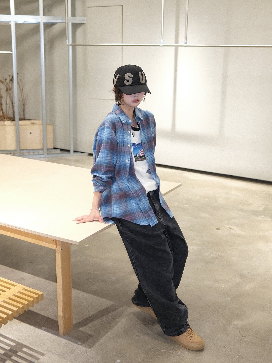 Photo by Kasina_Hannam on October 15, 2025. May be an image of standing, flannel, bowler hat, cornflower, lumberyard and text.