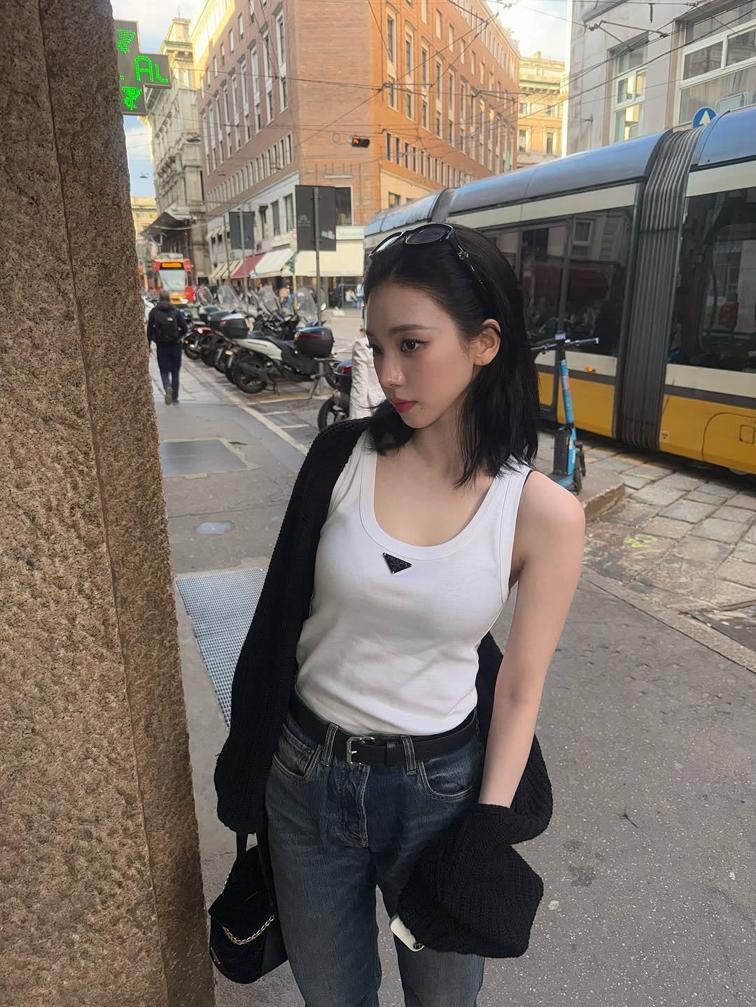Photo by KARINA on September 26, 2025. May be an image of 2 people, hair, bus, street and text.