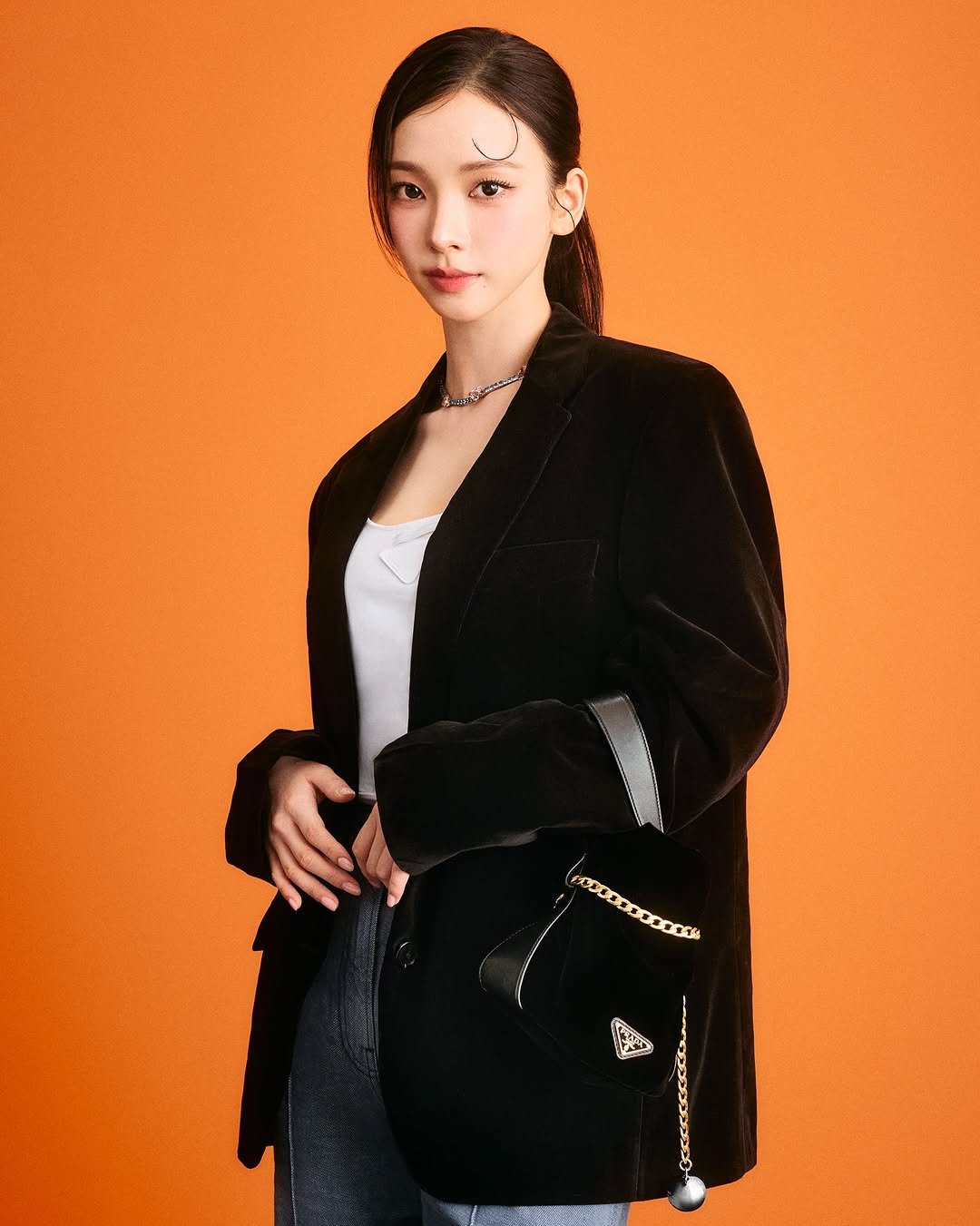 Photo shared by Prada on September 25, 2025 tagging @katarinabluu. May be an image of 1 person, duffle coat, overcoat, goosedown coat, fur coat, blazer, jacket, parka and text.