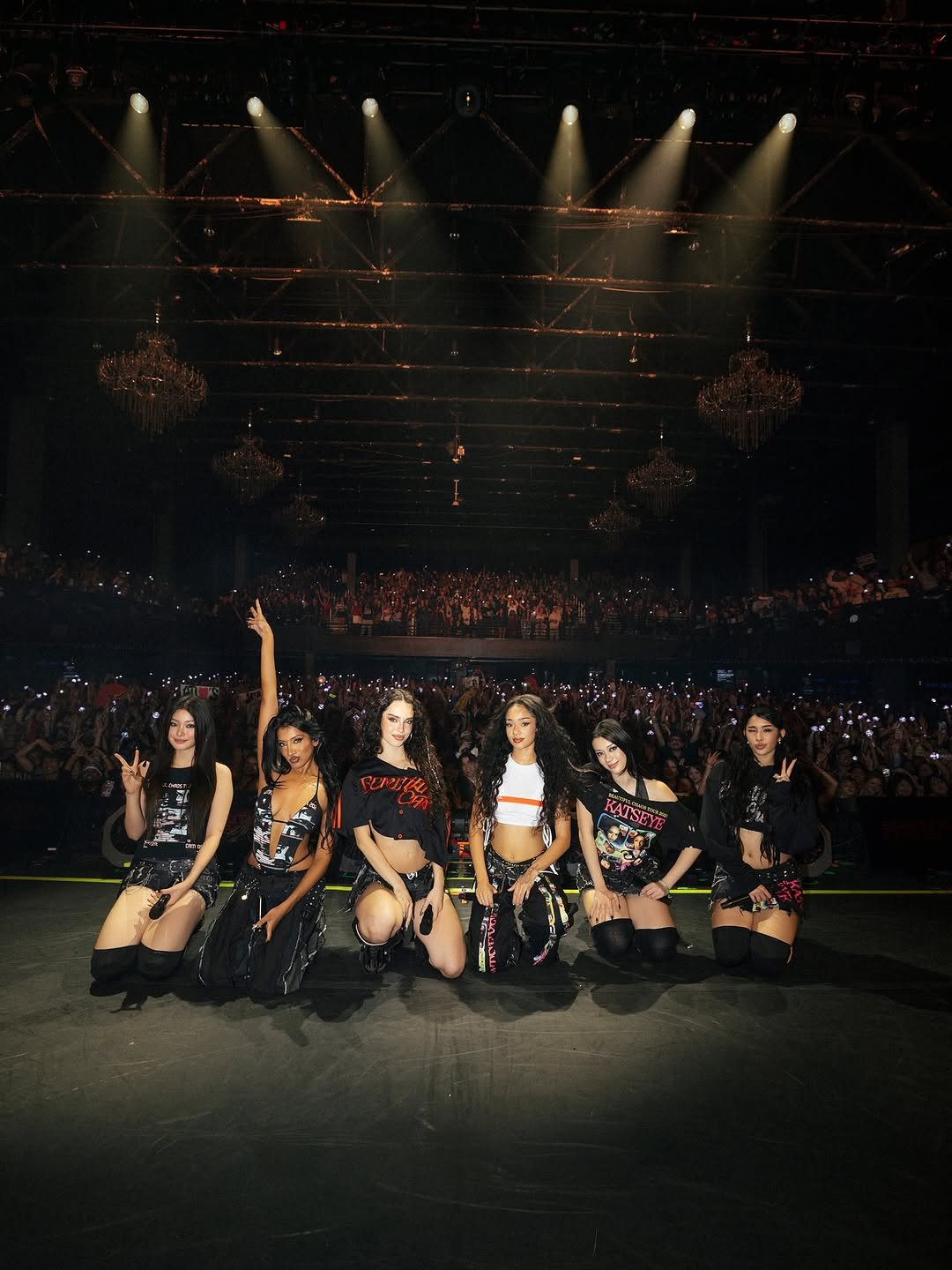 Photo by KATSEYE on November 28, 2025. May be an image of poster, concert and text.