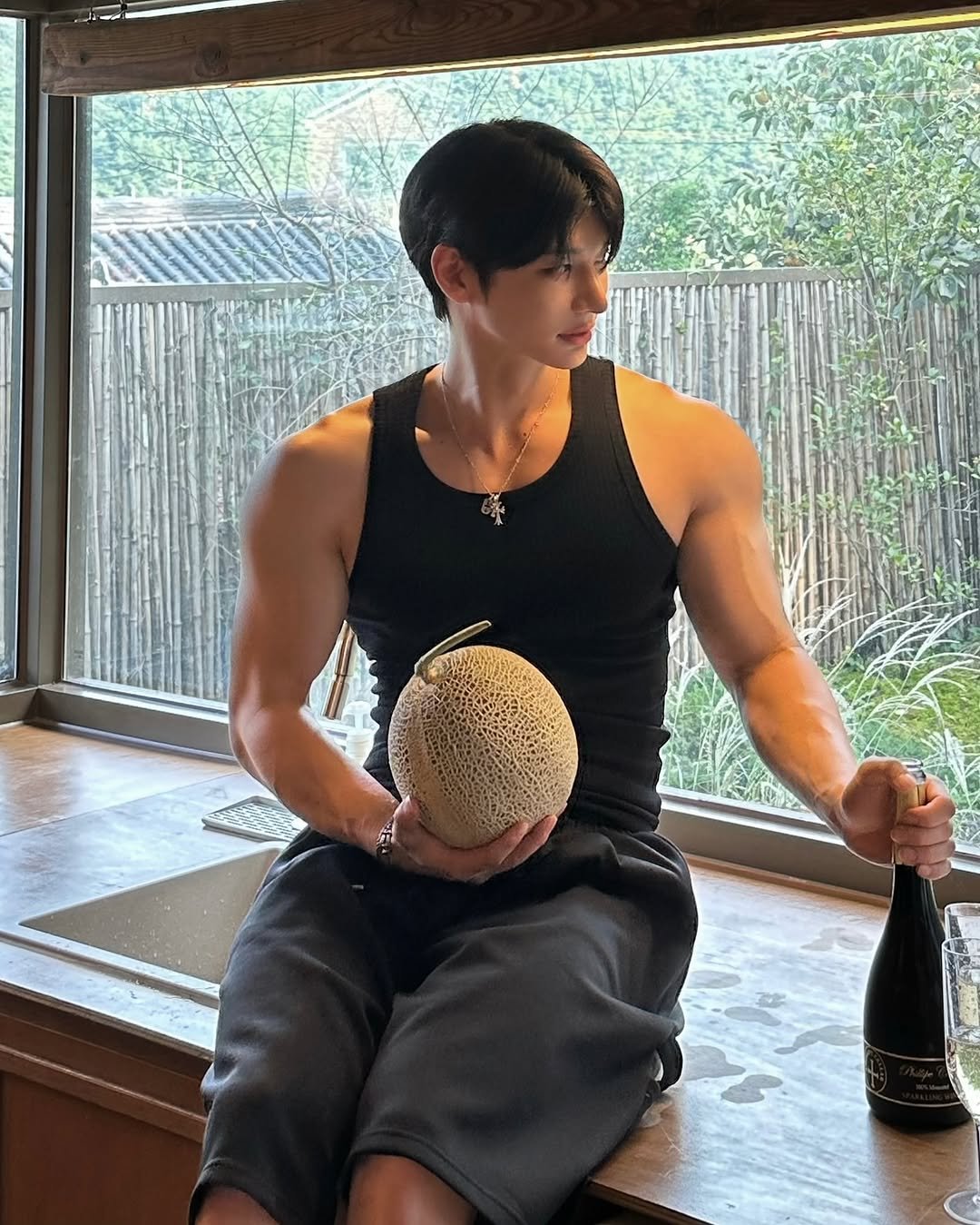 Photo by 은상원 on September 30, 2025. May be an image of 1 person, biceps, body building, water bottle, jug and text.