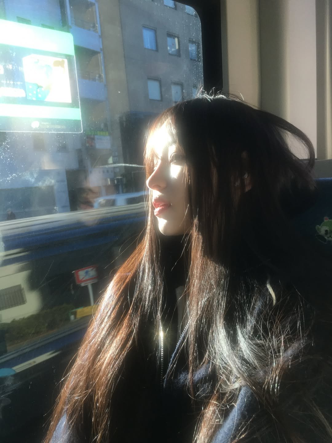 Photo by kend 켄드 on January 28, 2026. May be an image of one or more people, hair, train and bus.